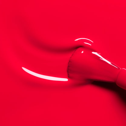 A makeup brush glides Manucurist&