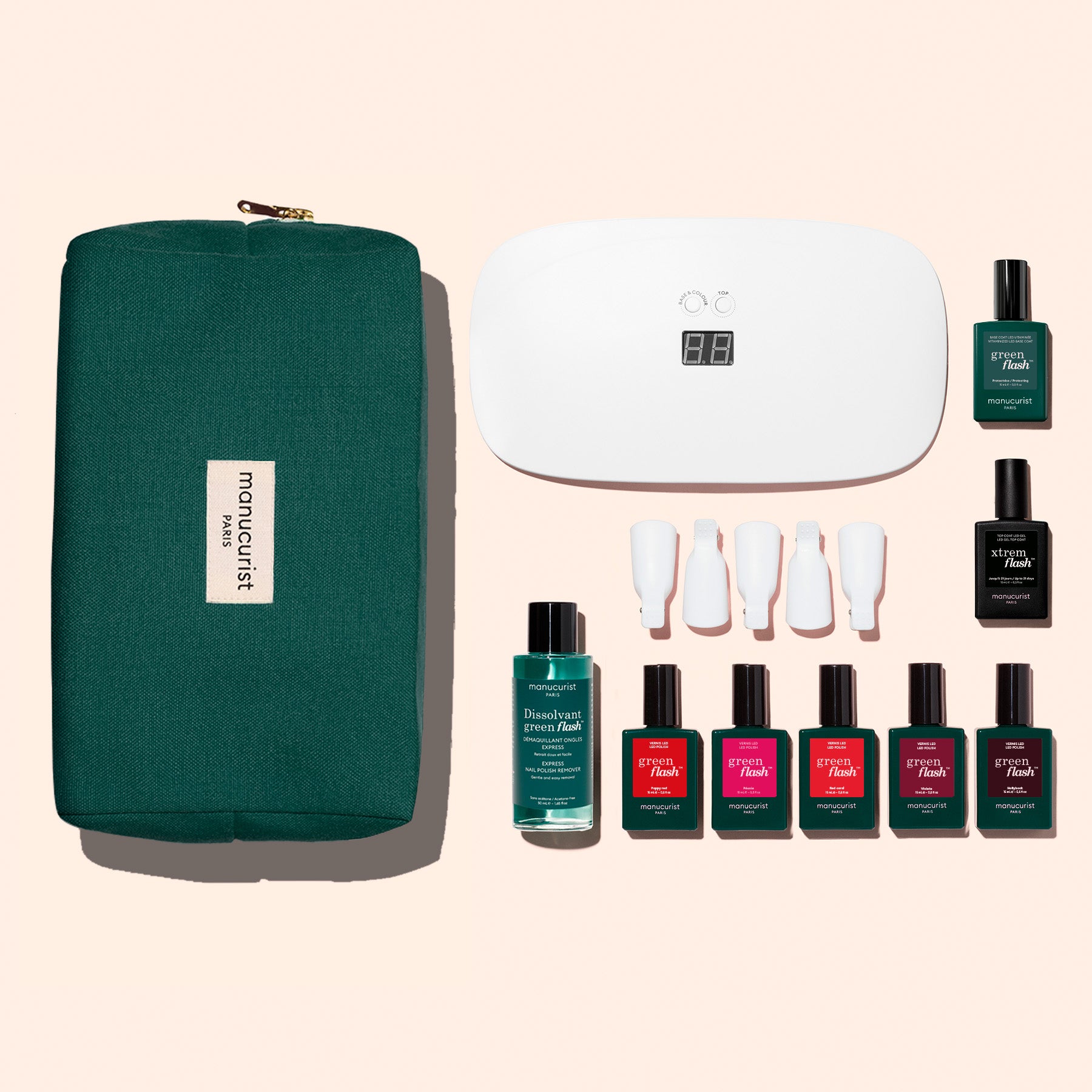The Manucurist Super Starter Kit features a green zippered pouch, white LED nail lamp, remover, four Green Flash gel polishes, two Vitaminized Base/Top Coats, and four nail tools—everything you need for an ultra-glossy manicure.