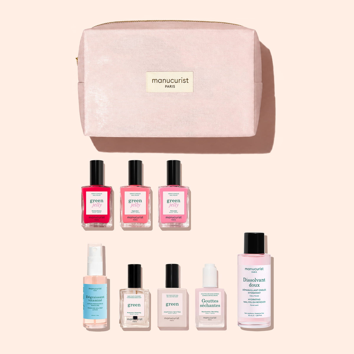 Manucurist Starter Kit - Jelly Nail Polish featuring three jelly polishes, a base coat, top coat, drying drop, cleanser, and remover arranged in front of an organic cotton pouch.