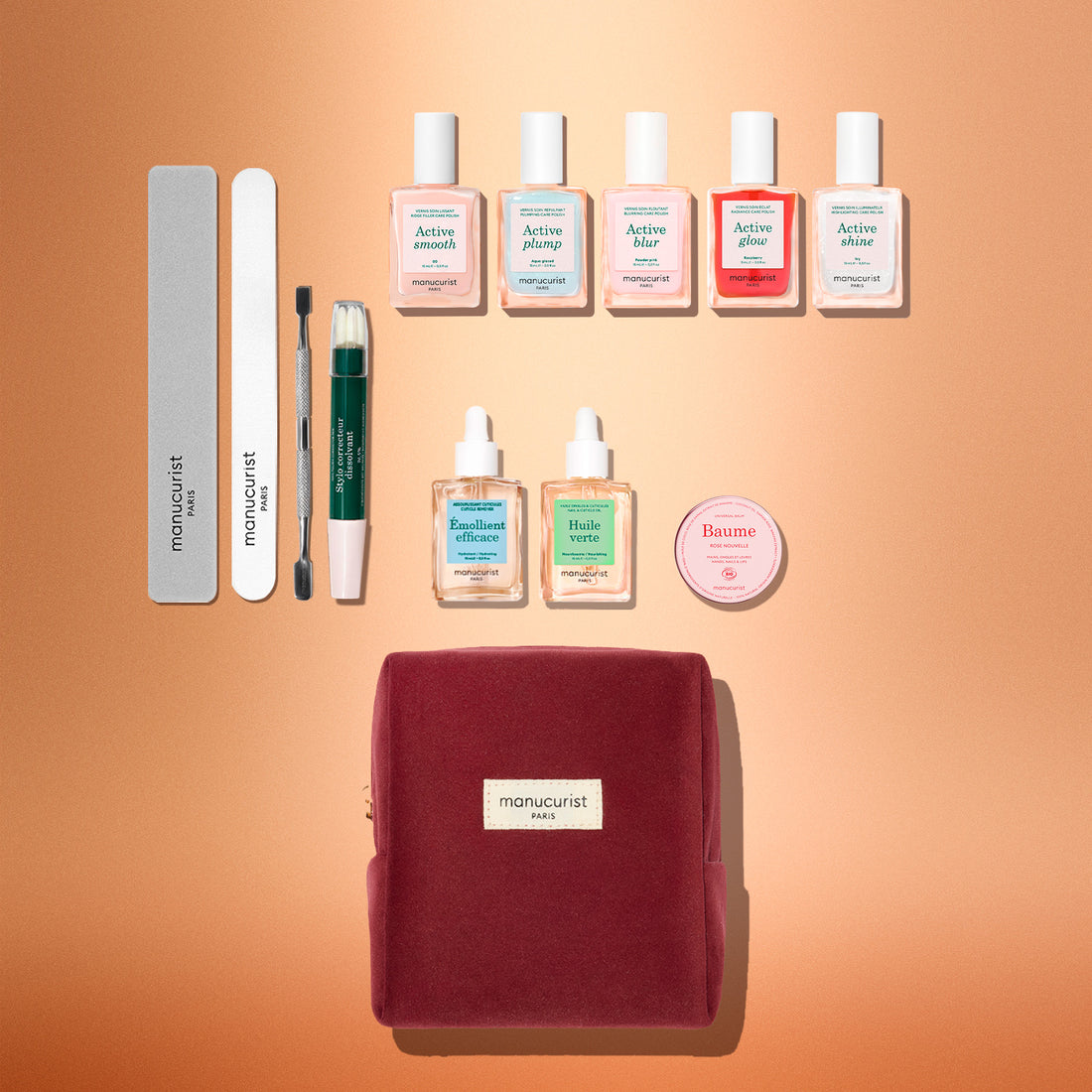 The Manucurist Active™ Super Ultimate Kit Gift Set includes five nail polishes, two cuticle oil droppers, a balm tin, two nail files, a cuticle pusher, a corrector pen, and a zippered storage pouch.