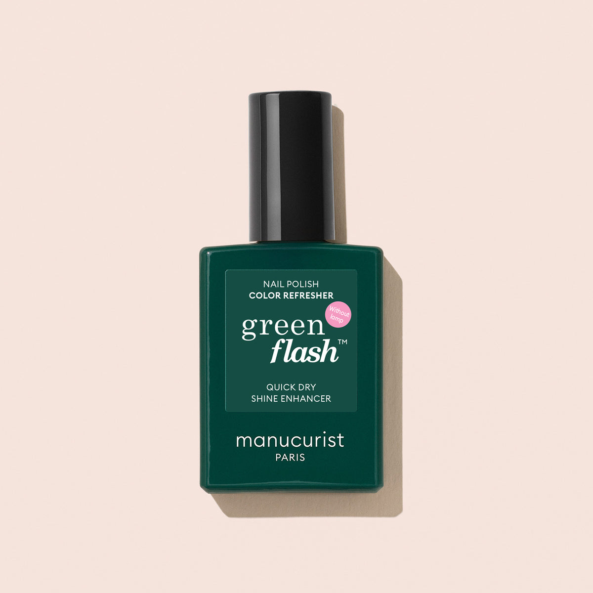 A bottle of Manucurist Colour Refresher, a quick-dry shine enhancer for manicure touch-ups in dark green, is shown against a light beige background.
