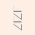Three white triangular wedges from Manucurist’s Nail Art Sponges - x4 are arranged vertically on a light beige background, each casting a shadow to the lower right.