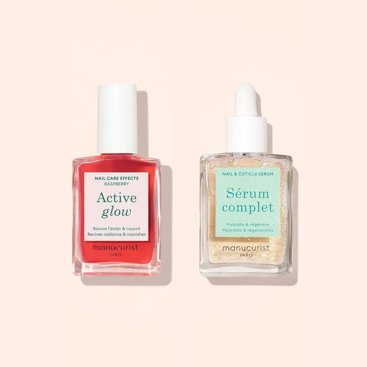 A bottle of red nail polish next to a clear Manucurist Complete Serum with a dropper cap used to strengthen nails.