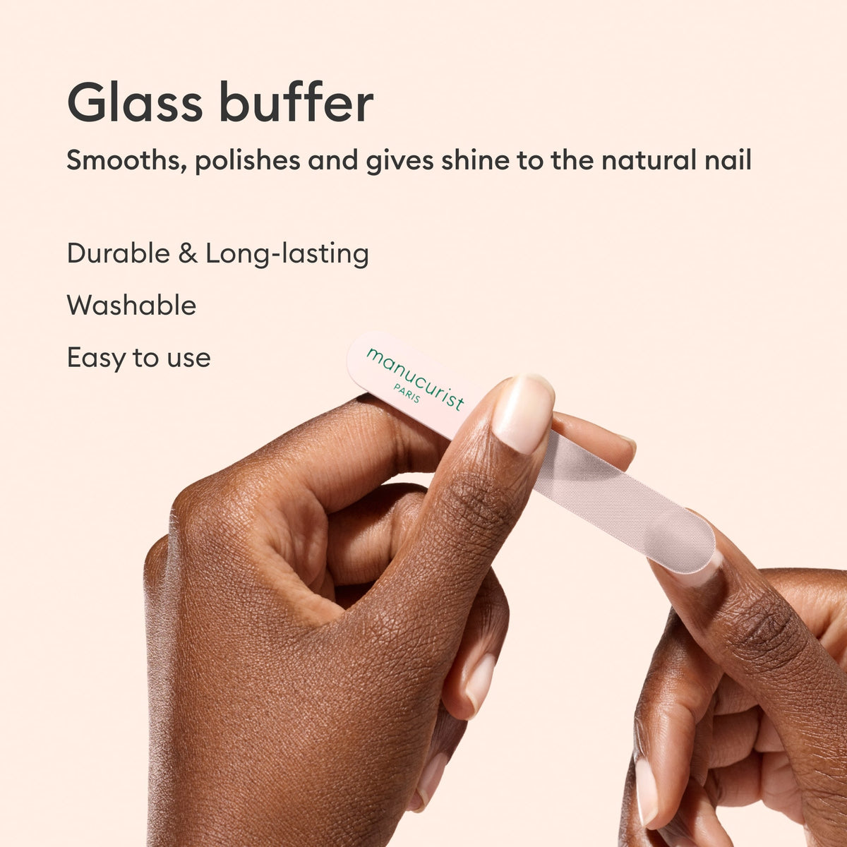 A hand uses the Manucurist Glass Polisher on the nail plate. Text highlights this durable, long-lasting, and washable buffer that’s easy to use and smooths, polishes, and shines natural nails.