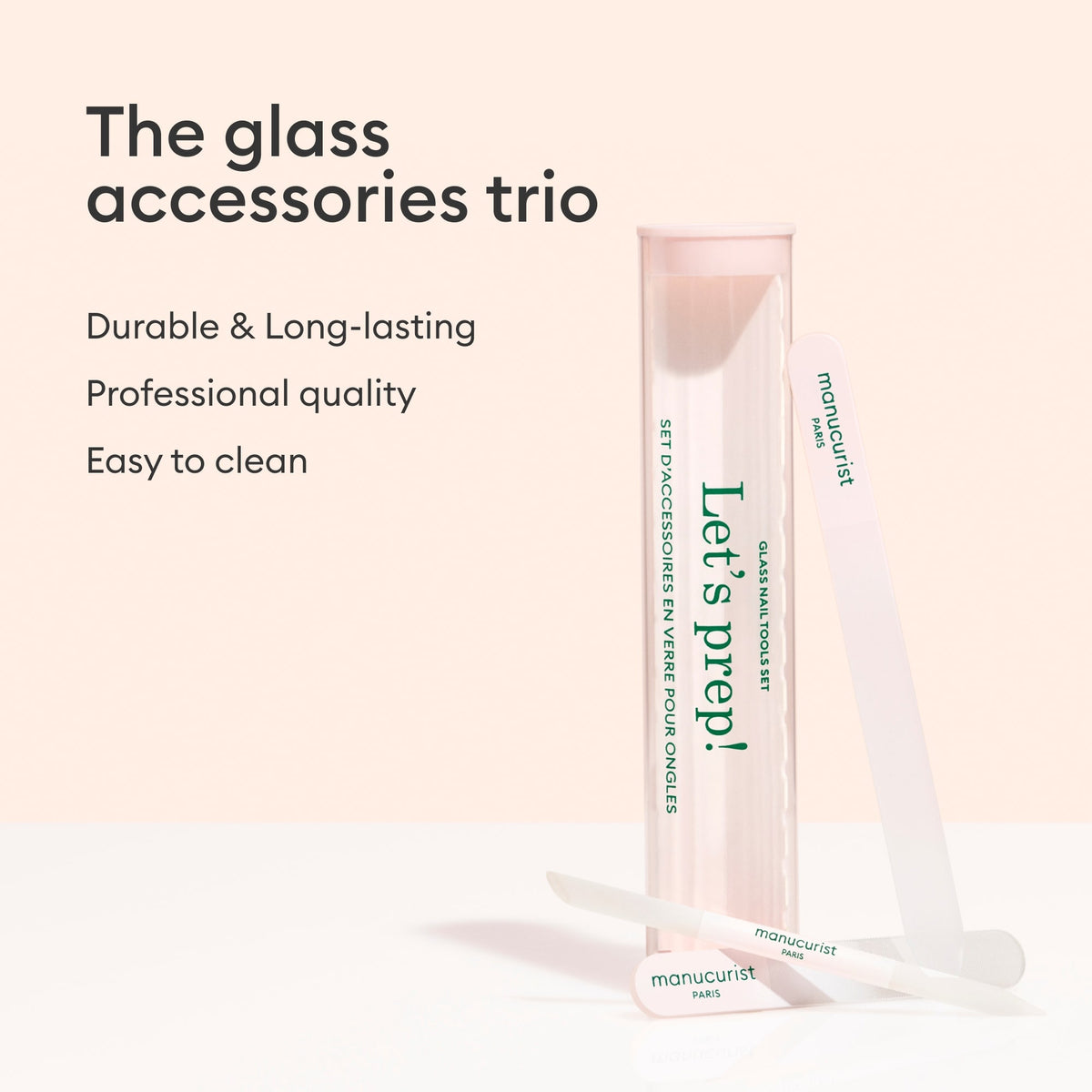The Manucurist Glass nail accessory trio—glass nail file, cuticle pusher, and more—sits beside a pink "Lets prep!" case. The text reads: Durable  Long-lasting. Professional quality. Easy to clean.